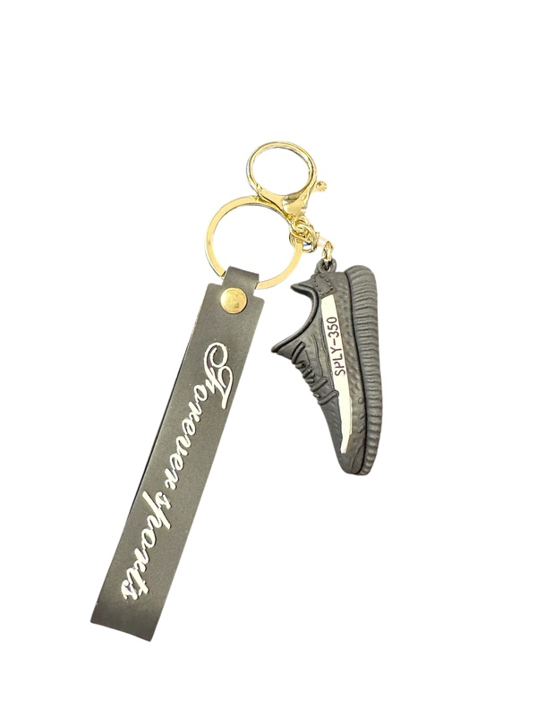 "Forever sports" nøkkelring med joggesko figurer