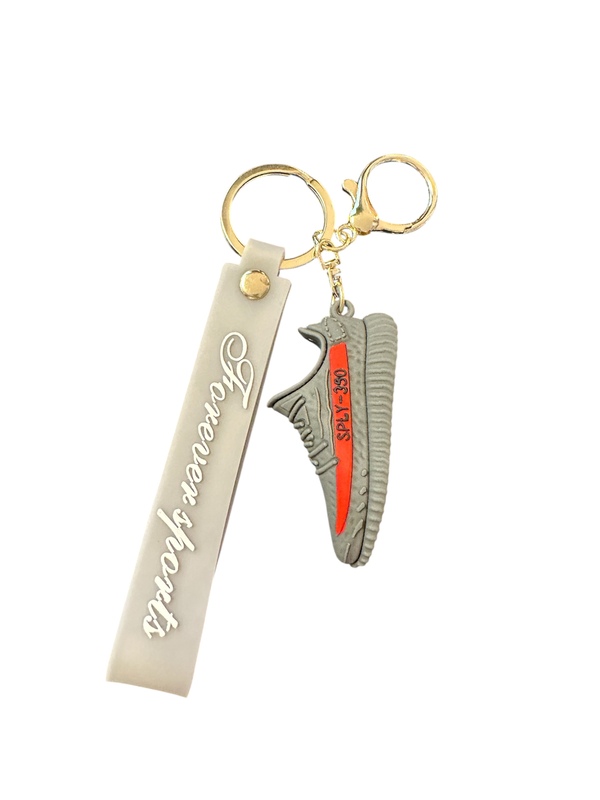 "Forever sports" nøkkelring med joggesko figurer