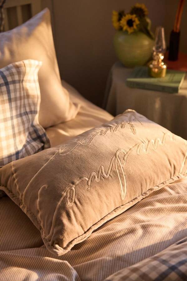 Logo-pute i økologisk bomullsvelur