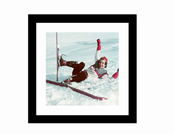 Bilde i ramme med glass "Kvinne på ski faller"