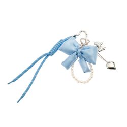 BAG CHARM BLÅ SLØYFE TINKA Blå sløyfe - Tinka